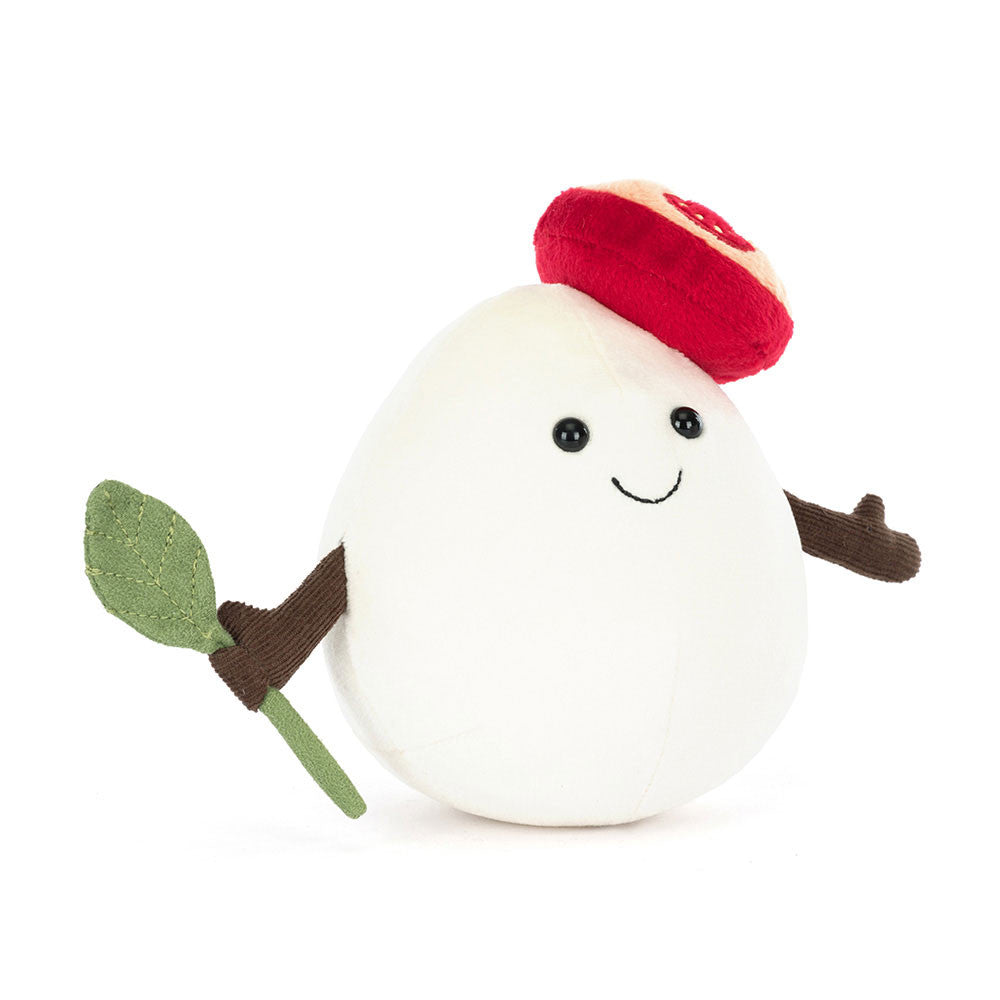 Jellycat Amuseables Mozzarella plush with tomato slice hat and basil leaf, front view.