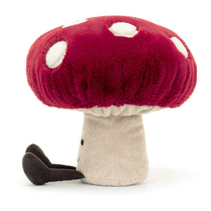 Side View: Side profile of the cuddly Jellycat Amuseables Mushroom. Highlights the perfect size for cuddling (suitable from birth!), the soft plush texture with a hint of squish, and the captivating details like the ruched frills and weighted base for stability. A charming friend for forest adventures!