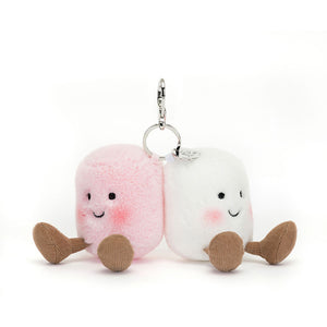 Straight On View: Front view of the adorable Jellycat Marshmallow Bag Charm. Features two soft,( one pink & one white ) plush marshmallows with embroidered smiley faces, rosy cheeks, and a secure silver claw clip for easy attachment to your bag. A delightful addition for any marshmallow lover!