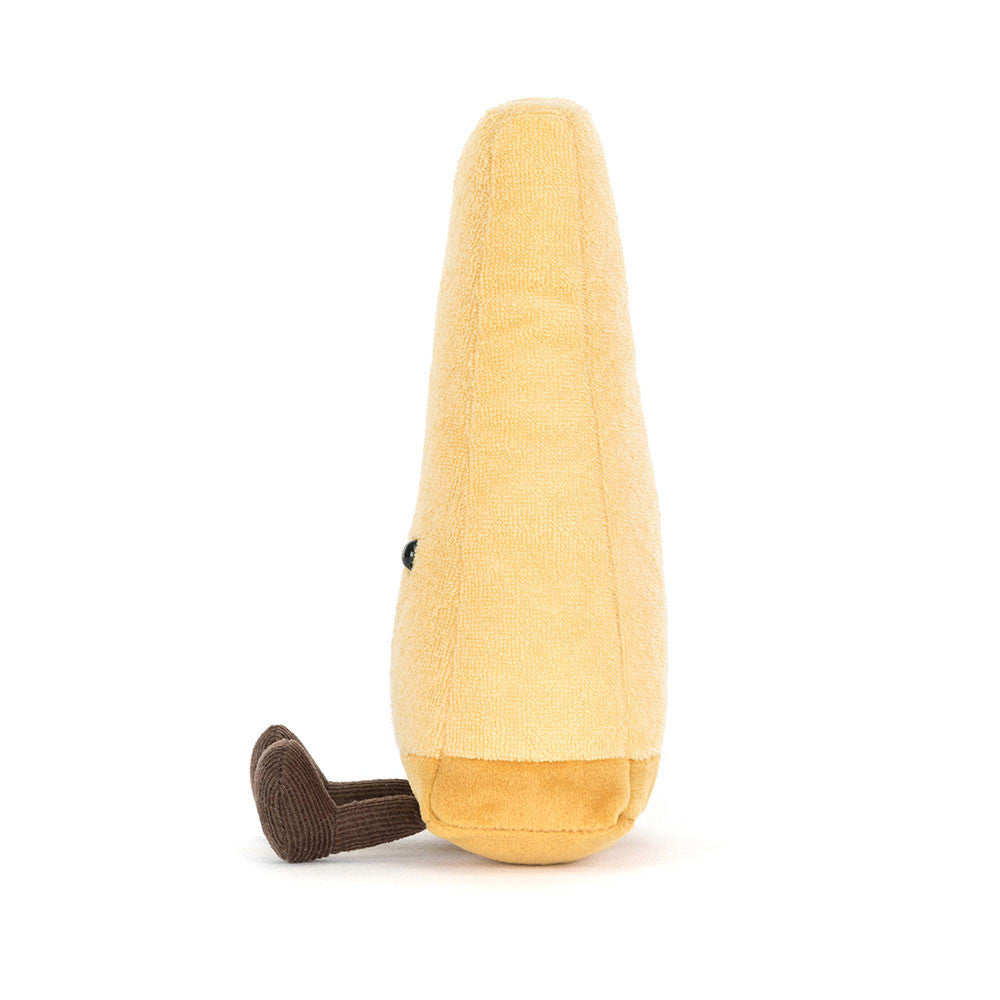 Side view of Amuseables Parmesan showing pale yellow fur and textured golden rind.