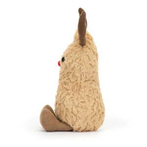 A side view of the Jellycat Amuseable Peanut Reindeer, showing its textured fur and cocoa antlers.
