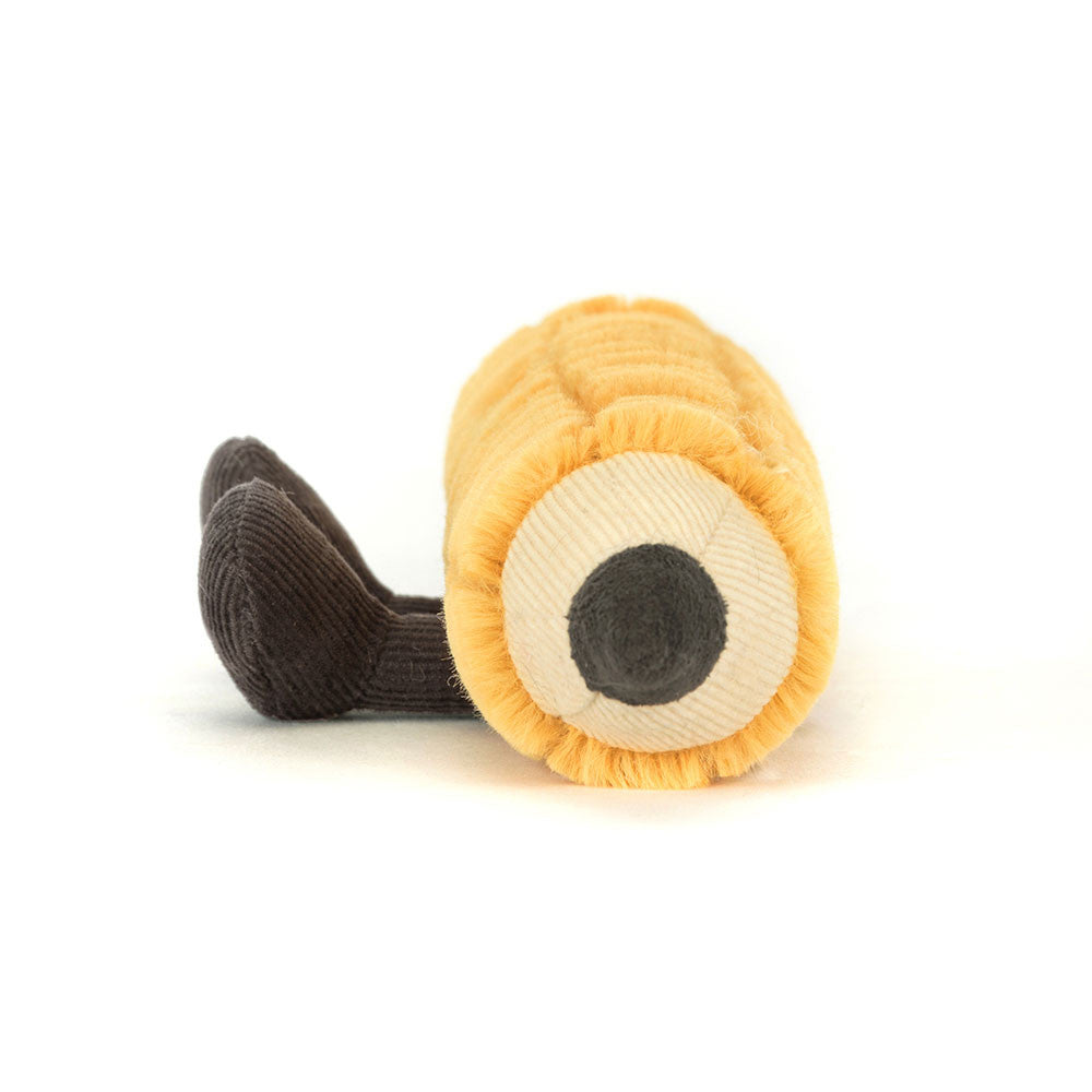 Close-up of the pencil tip on the Jellycat Amuseables Pencil plush, featuring a soft cream and black textured point and corduroy feet from a front angle