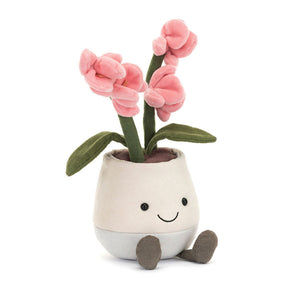 Side profile of the Jellycat Amuseables Pink Orchid plush, showing the depth of its flowers and the design of its trendy two-tone pot.