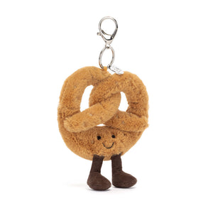 Front View: Jellycat Amuseables Pretzel Bag Charm with smiling face and soft plush fabric.