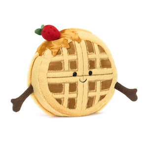 Front view of Jellycat Amuseables René Waffle plush toy with a cute embroidered smile and strawberry topping.