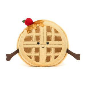 Angled view of René Waffle plush with its friendly arms and warm golden tones.