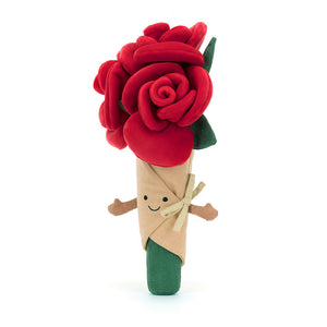 Angled View: Jellycat Amuseables Rose Bouquet, a trio of red roses wrapped in linen.