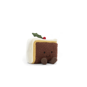 Full View: Festive Delight! The Jellycat Amuseable Slice of Christmas Cake showcasing Soft brown cake, luxe suede marzipan, and creamy white cing.