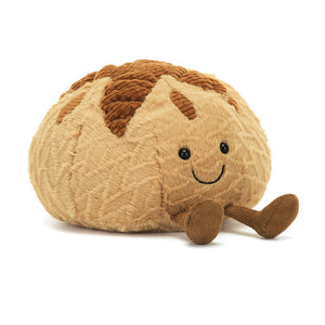 Front view of Jellycat Amuseable Sourdough plush toy with smiley face and cord legs.