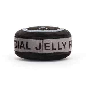 Back View: Backside of the Jellycat Amuseables Sports Ice Hockey Puck showcases the soft black fur and embroidered hockey sticks.