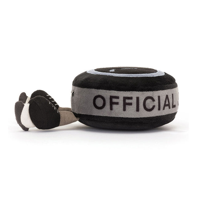 Side View: Side profile of the Jellycat Amuseables Sports Ice Hockey Puck. Highlights the cute little  iceskates