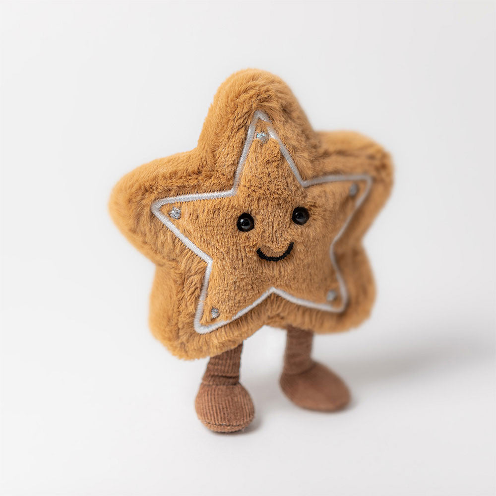 Jellycat Amuseables Star Cookie soft toy standing with embroidered icing detail.