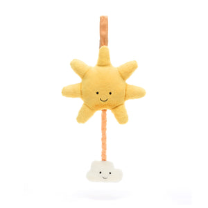A side view of a Jellycat Amuseable Sun Musical Pull, highlighting its textured, sunshine-like fur, dimension of the floppy rays, and a dangling star for musical playtime.