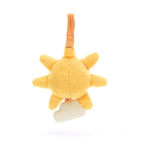 A Jellycat Amuseable Sun Musical Pull seen from behind, showing its super soft fur, embroidered details, and a dangling star ready to bring musical sunshine.