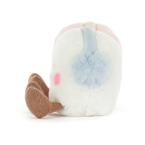 Side view of Jellycat Amuseables Toastie White Marshmallow showing fluffy blue earmuffs and embroidered smile.