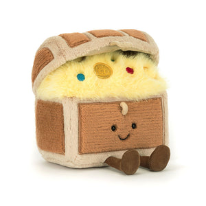 Jellycat Amuseables Treasure Chest plush toy with smiling face, fluffy yellow treasure, and a gold coin detail, sitting upright.