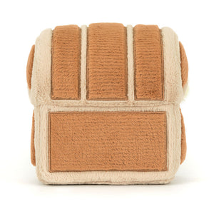 Back of Jellycat Amuseables Treasure Chest showing soft brown and beige plush panels designed to look like a classic wooden chest.