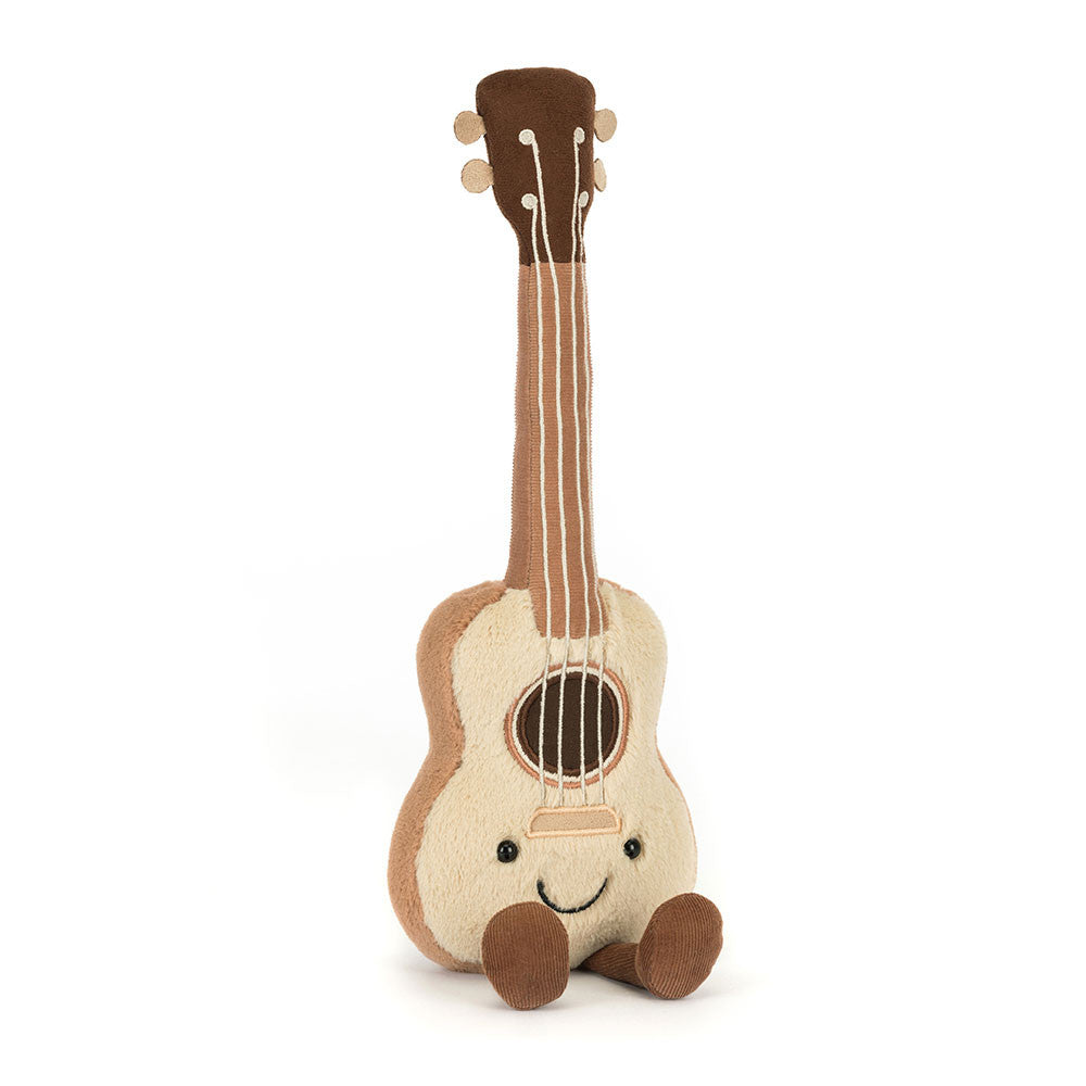 Front view of Jellycat Amuseables Ukulele plush toy with smiley face, beige body, and brown details.