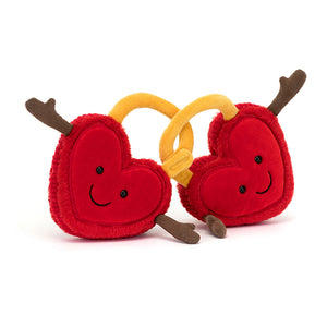 Angled View: Jellycat Amuseables Val & Tina Love Locks, a cuddly red duo with golden locks.