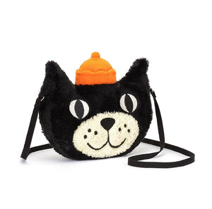 This Jellycat Jack Bag is a soft and stylish tote shaped like a cheeky black and white cat with big button eyes and a mischievous grin. He wears a signature orange jelly hat.