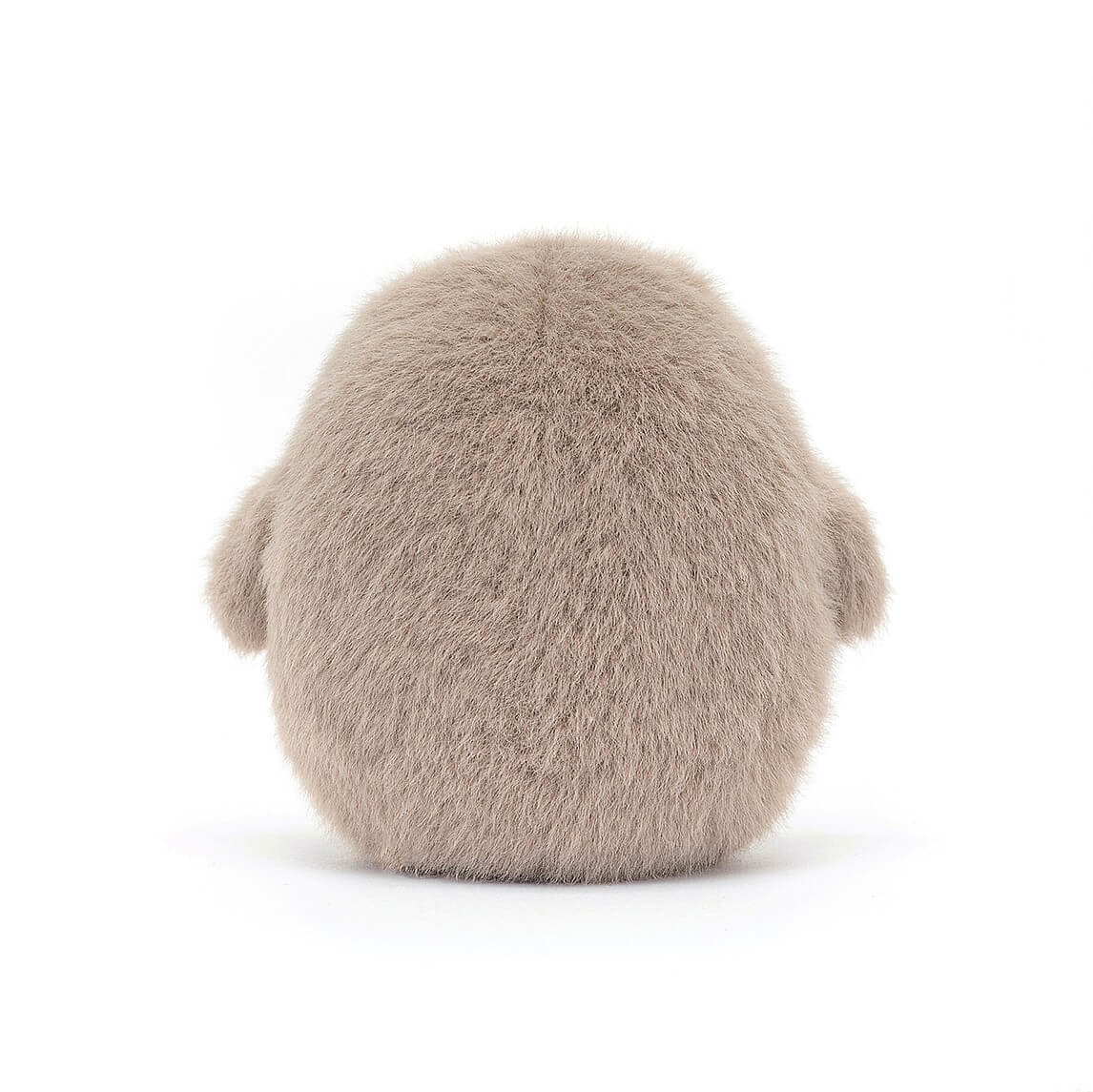A Jellycat Barn Owling plush toy seen from behind, showing its soft wings and a glimpse of its sweet buttercream tummy.