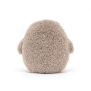 A Jellycat Barn Owling plush toy seen from behind, showing its soft wings and a glimpse of its sweet buttercream tummy.