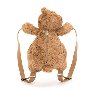 Back View: Backside of the Jellycat Bartholomew Bear Backpack showcases the soft toffee fur and a cute, embroidered tail. This cuddly bear backpack adds a touch of whimsy to any adventure, with adjustable straps for a comfy fit.