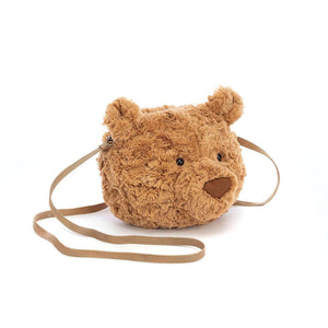 Carry cuteness everywhere! Bartholomew Bear Bag features soft fur, petal ears & a sturdy zipper. This charming cross-body bag is perfect for little adventures.