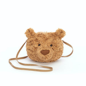 Bartholomew Bear is ready to hang out! This adorable cross-body bag boasts soft fur, a sturdy zipper & a long strap. Style meets practicality for your little trendsetter.