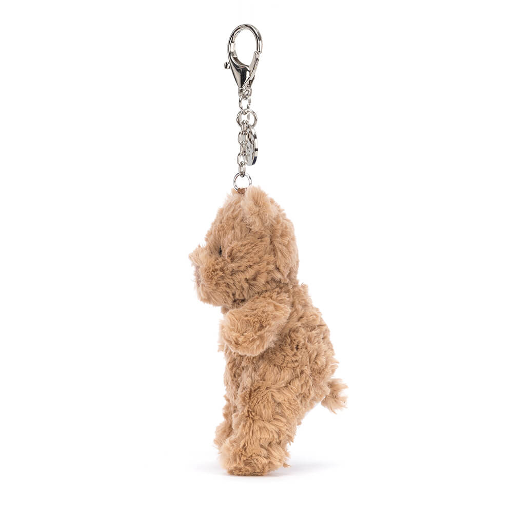 From the side the Jellycat Bartholomew Bear Bag Charm.