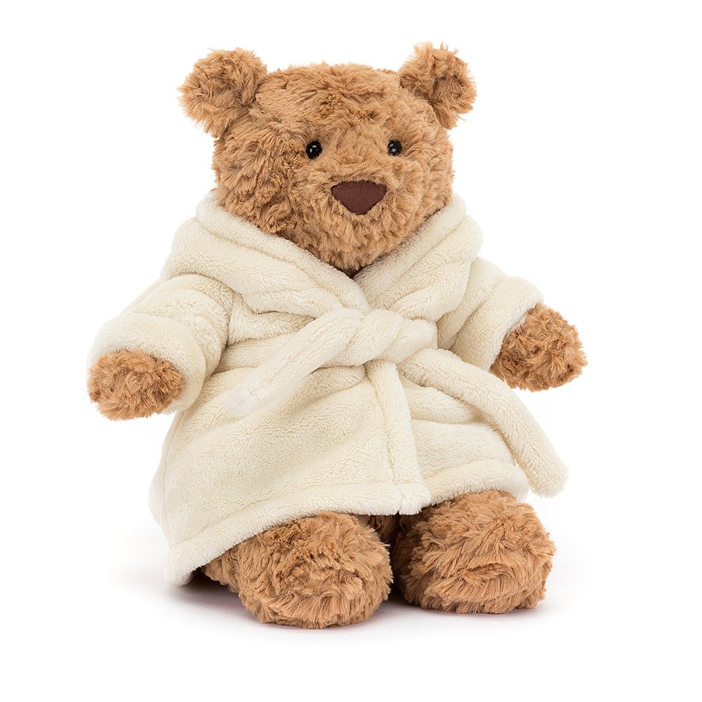 Jellycat Bartholomew Bear Bathrobe, with brown fur, wearing a soft, bunny-eared bathrobe.