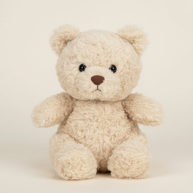 Jellycat Bartholomew Bear Junior cream curly fur on off-white background