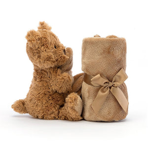 A comforting sight for sleepyheads! The Jellycat Bartholomew Bear Soother wraps its arms around a luxuriously soft, fudge-brown blanket. (Side view)