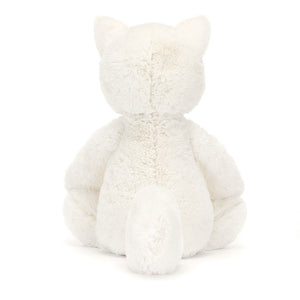 Back view of Jellycat Bashful Arctic Fox plush toy, showing the full length of his tail and the texture of his fur.