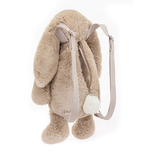 Angled view of the Bashful Beige Bunny Backpack highlighting the plush texture and zip closure.