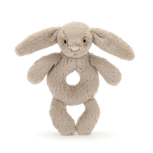 Sensory Exploration Starts Here! The Jellycat Bashful Beige Bunny Ring Rattle features a soft bunny and a gentle rattle for playtime fun. (Front view)