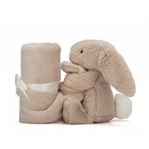 Security & Softness Combined! The Jellycat Bashful Beige Bunny Soother offers a floppy-eared friend with a comforting, side-rolled blanket for bedtime. (Blanket rolled up to the side)