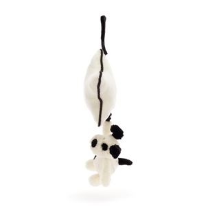 Ready for Adventures & Lullabies! The Jellycat Bashful Black & Cream Puppy Musical Pull's lightweight design and playful pup with a pull-cord make it perfect for playtime or bedtime. (Side view)