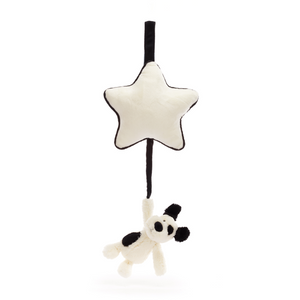 Sweet Dreams Guaranteed! Pull the cord on the Jellycat Bashful Black & Cream Puppy Musical Pull to activate a gentle lullaby, perfect for bedtime. (Pull pulled)