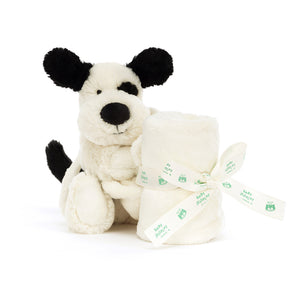 Cuddles & Security Rolled Up! The Jellycat Bashful Black & Cream Puppy Soother offers a soft puppy friend with a rolled-up blanket for ultimate comfort. (Blanket rolled up, front view)