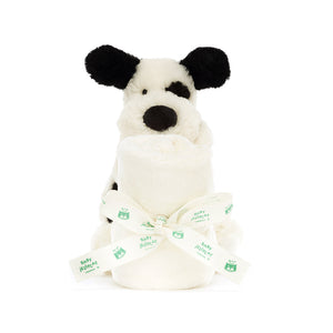 Sweet Dreams Guaranteed! The Jellycat Bashful Black & Cream Puppy Soother features a soft puppy with a rolled-up blanket for a secure night's sleep. (Blanket rolled up, back view)