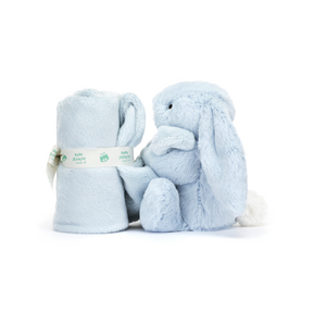A side view of Jellycat Bashful Blue Bunny Soother, with a fur square tied baby Jellycat ribbon.