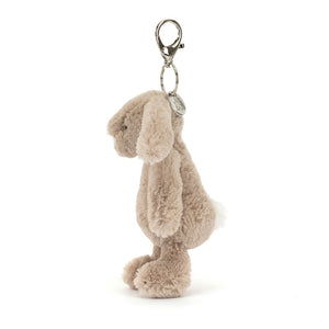 Side view of Jellycat Bashful Beige Bunny Bag Charm (2025), showing the bunny’s adorable profile and fluffy tail.
