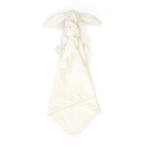 Ready for Bedtime: The Jellycat Bashful Cream Bunny Soother's cuddly bunny hangs with its attached blanket below, beckoning for bedtime snuggles.