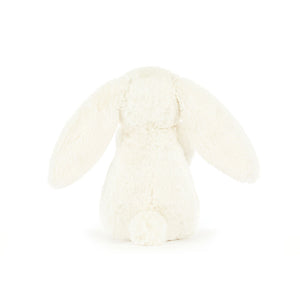 Back view of Jellycat Bashful Bunny ‘Peony’, with its plush fabric and fluffy tail.