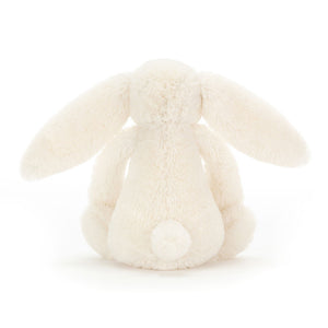 Jellycat Bashful Christmas Bunny's fluffy fur in a creamy white colour showcasing its long floppy ears.