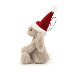  Soft Jellycat Bashful Christmas Bunny Decoration (side view): Praline bunny wearing a berry hat with cream trim & pompom. 