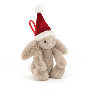 Jellycat Bashful Christmas Bunny Decoration: Praline bunny with berry hat, cream trim & pompom (angled view).