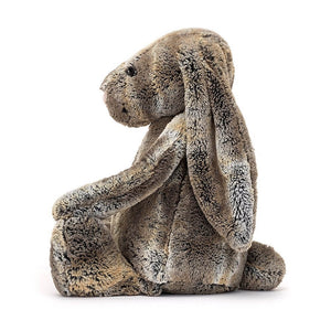 Peek at the playful side of the Bashful Cottontail Bunny! This cuddly friend boasts two-tone fur & a sweet expression, ready for adventures.