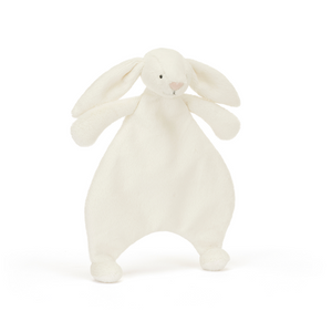 At An Angle: Ready for snuggles! Peek-a-boo with the Jellycat Bashful Bunny Comforter – a floppy-eared friend with a luxuriously soft blanket.